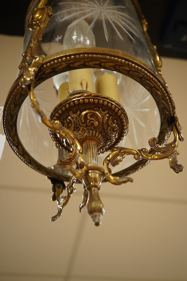 A French gilt brass and engraved glass lantern, 47cm high. Condition - fair/good